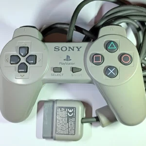 Manette officielle Sony PS1 – modèle original d’occasion en bon état
